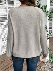 Gray ribbed maternity shirt with button detail and contrast trim