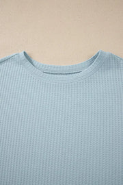 Light blue waffle knit maternity overshirt with crew neck