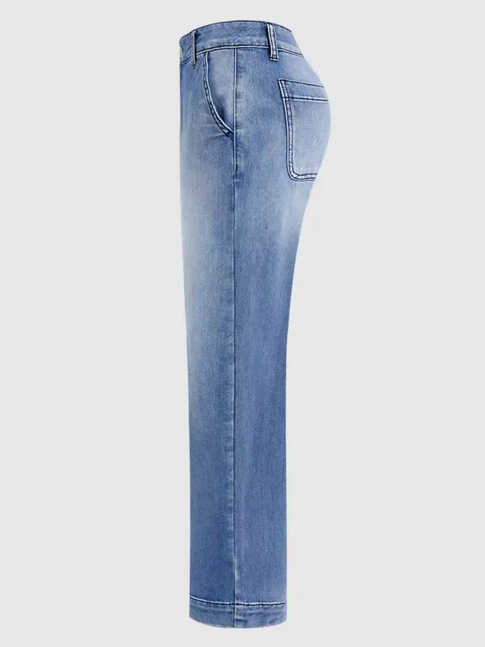 Relaxed high-waisted denim maternity jeans in light blue wash with cuffed hem and pockets.