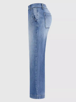 Relaxed high-waisted denim maternity jeans in light blue wash with cuffed hem and pockets.