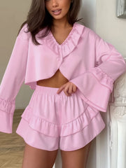 Pink ruffled V-neck pajama set with shorts and bell sleeves