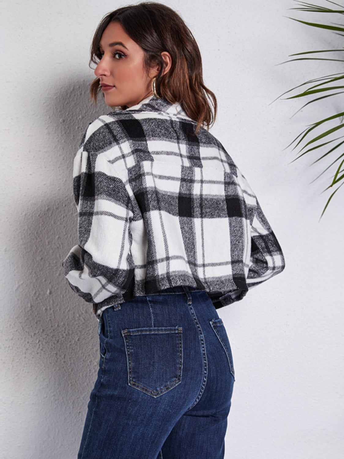 Chic plaid jacket in gray and white with button front and pockets, styled with denim.
