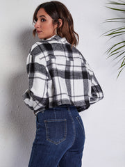 Chic plaid jacket in gray and white with button front and pockets, styled with denim.