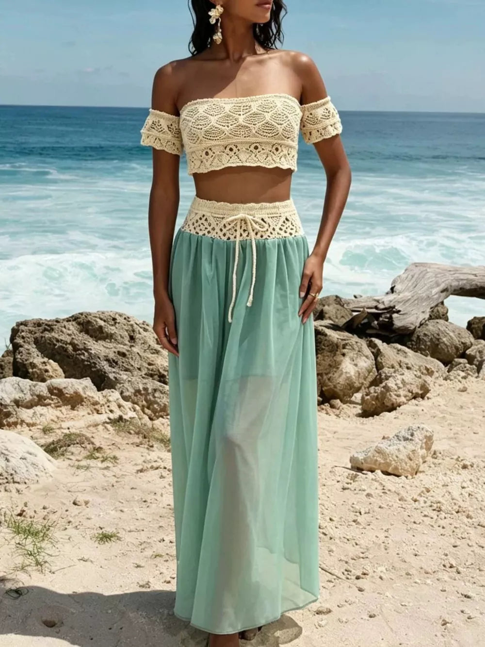 Crochet bandeau top and sheer maxi skirt set in cream and pastel blue, off-shoulder style
