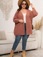 Chunky knit cardigan in tan with balloon sleeves and an open front.