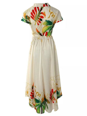 Tropical print crop top and a-line skirt set with elastic waist and short sleeves.