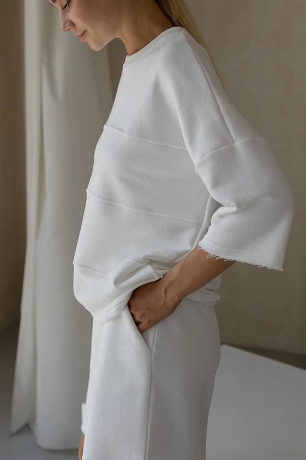 Relaxed seam detail sweatshirt and short set in pastel blue, casual loungewear.