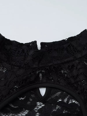 Black lace cutout mini dress with mock neck detail