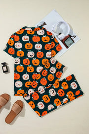 Orange pumpkin patch pajama set with short sleeves and pants.