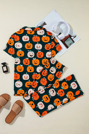 Orange pumpkin patch pajama set with short sleeves and pants.