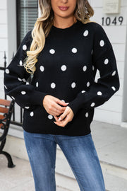 Black polka dot knit sweater with balloon sleeves and crew neck