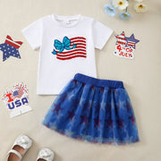 Patriotic baby outfit: white tee with sequin flag applique, blue tulle skirt with stars.