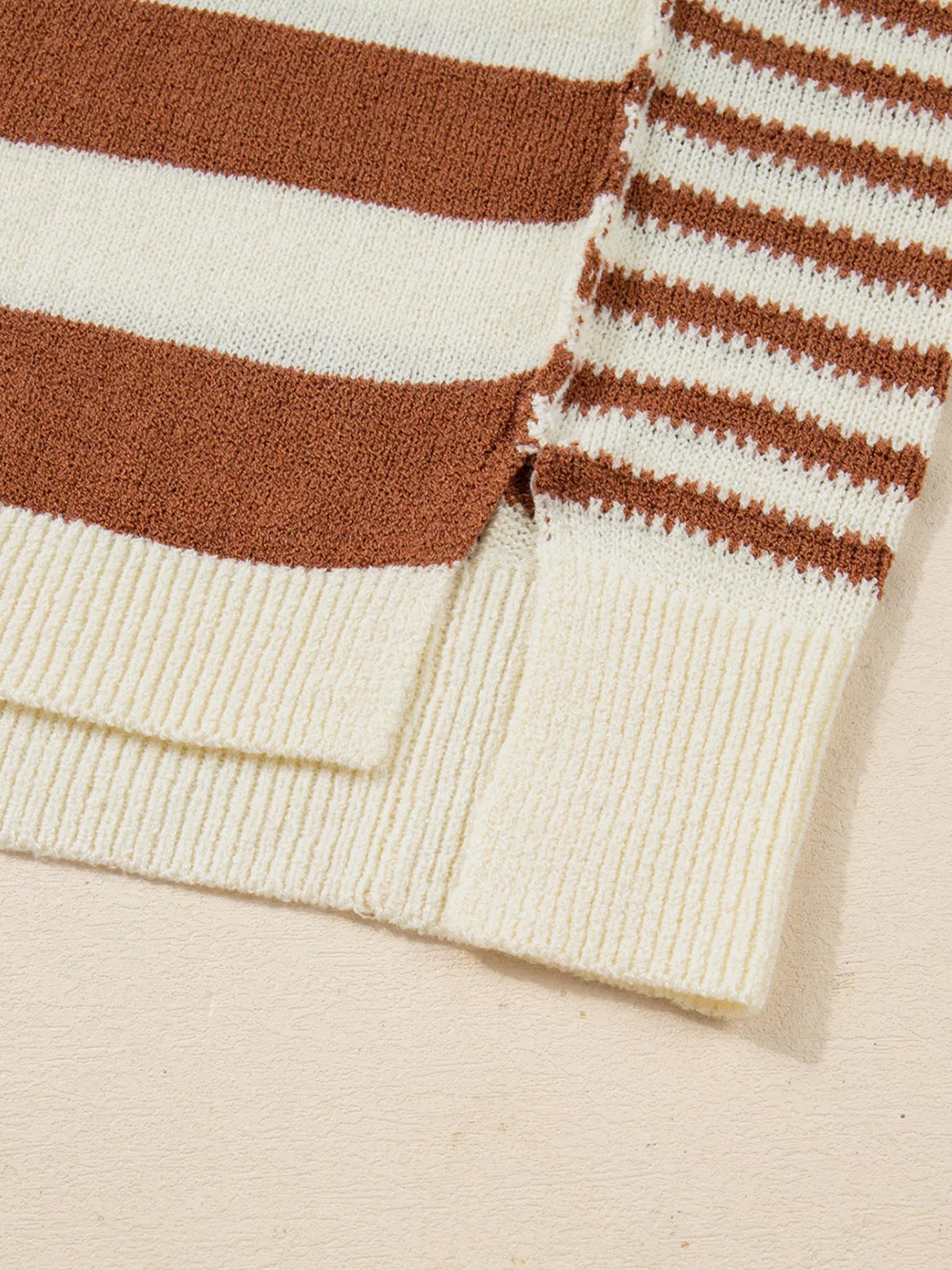 Patchwork drop shoulder sweater in caramel and cream stripes with ribbed cuffs and hem detail.