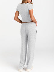 Gray round neck tee and relaxed fit drawstring pants set.