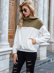 White fleece hoodie with quilted olive green shoulder block and quarter zip.