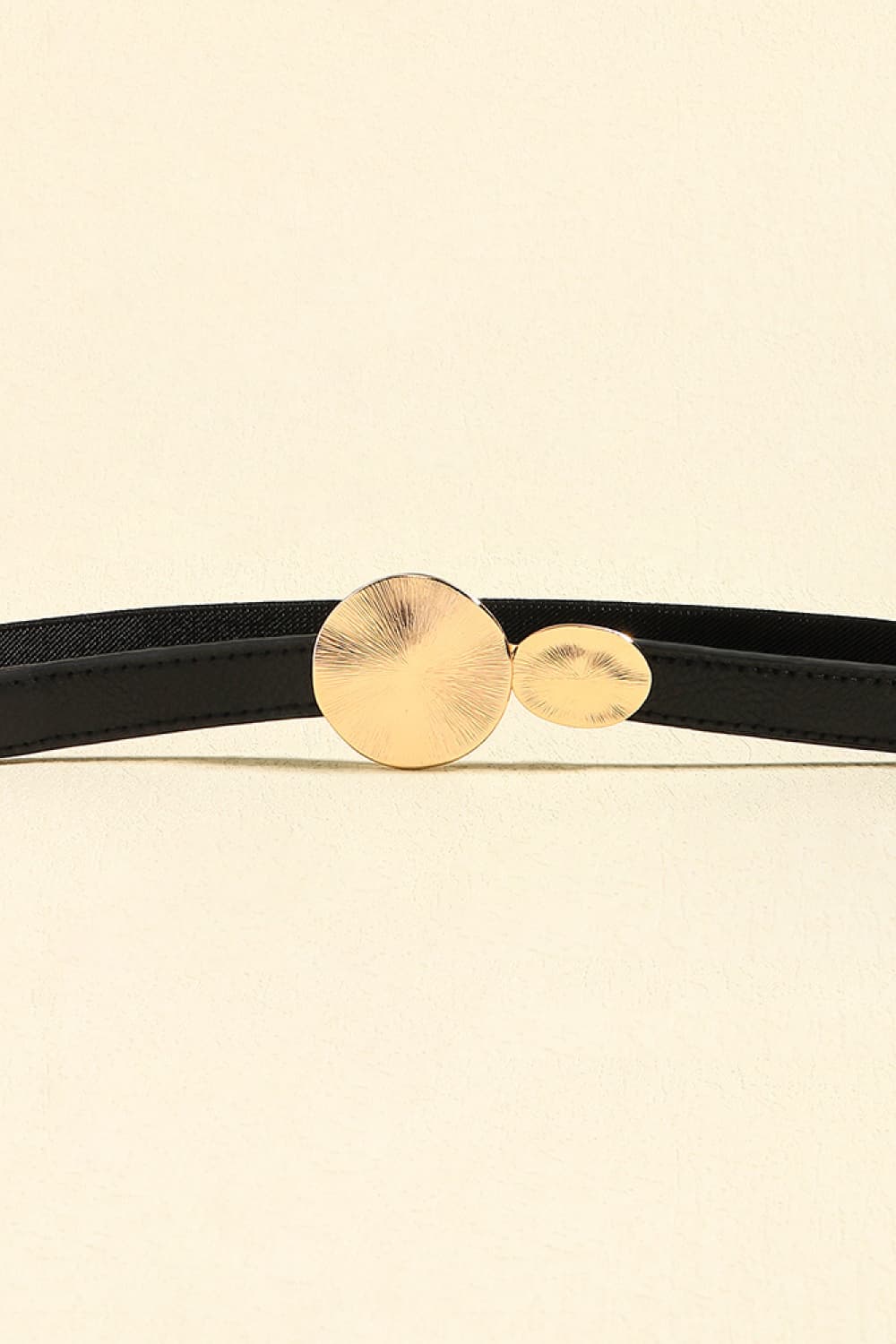 Black elastic waist belt with gold disc detail buckle