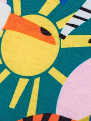 Toddler dress with playful jungle print, featuring a yellow sun, teal background, and pink accents.