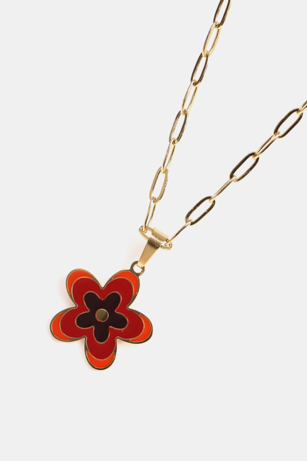 Enamel floral pendant necklace in red and black on a gold-plated chain