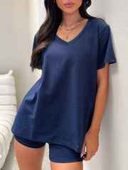 Navy V-neck lounge set with relaxed fit t-shirt and matching shorts.