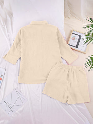 Gauze cotton resort shirt and shorts set in Tan, with buttoned shirt and elastic waist shorts.