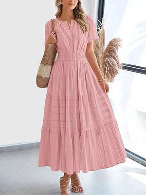 Dusty Pink ruched V-neck tiered midi dress with smocked waist and short sleeves.