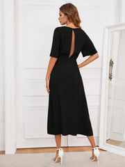 Black midi dress with short sleeves and a keyhole back detail.