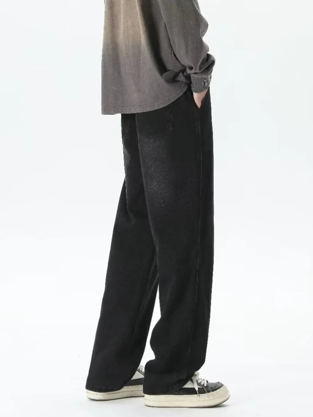 Men's relaxed fit black gradient wash jeans with drawstring waist.