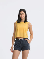 Pastel Yellow cropped active tank with mesh inset back detail.