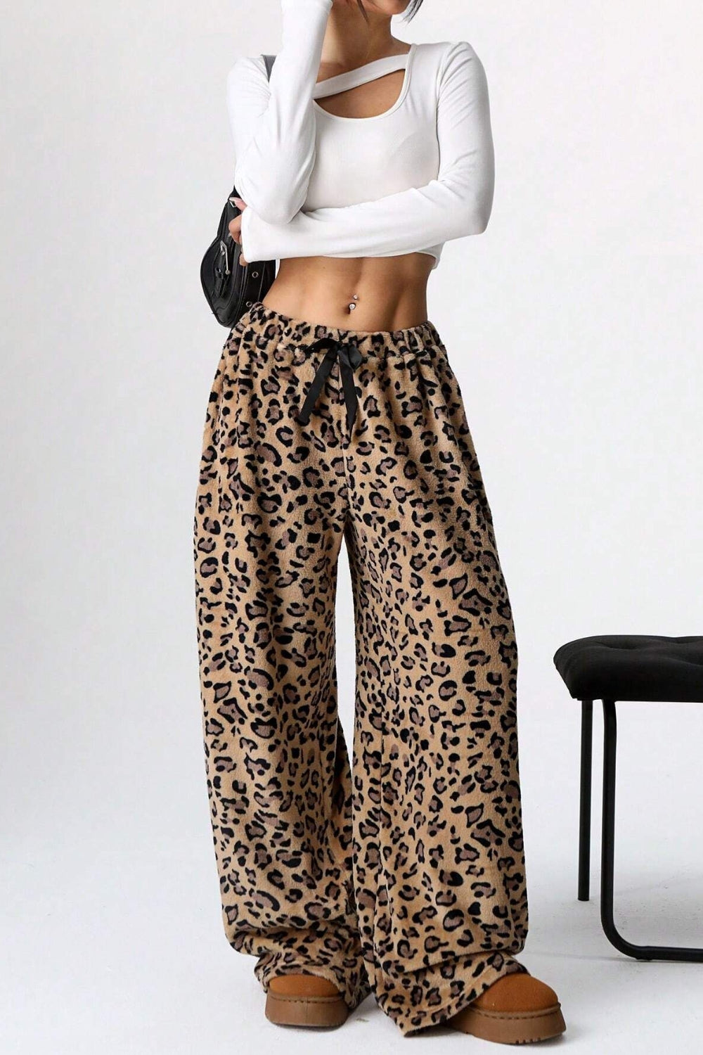 Leopard plush palazzo lounge pants with drawstring waist and wide leg.