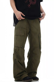 Olive green relaxed fit cargo pants with multiple pockets.