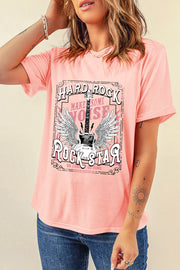 Watermelon pink graphic tee with a winged guitar and "Hard Rock Rock Star" text.