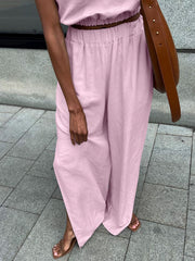Pink cotton crop top and wide-leg pants set with elastic waistband.
