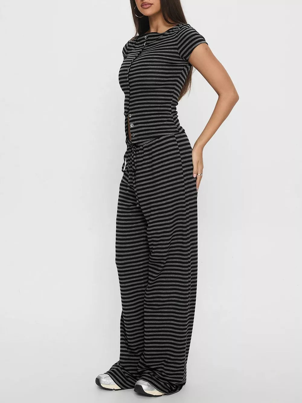 Striped cropped button-down top and wide-leg pants set in dark gray and black.
