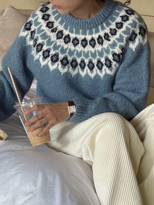 French Blue acrylic sweater with a fair isle pattern and round neck.