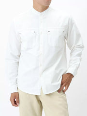 White cotton casual long sleeve shirt with button-down front and two chest pockets.