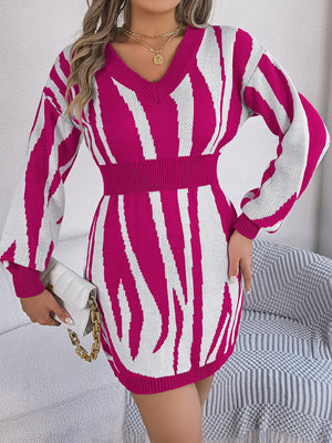 Cerise zebra stripe knit fit-and-flare dress with V-neck and long sleeves.