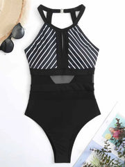 Black halterneck mesh swimsuit with white stripes and keyhole detail