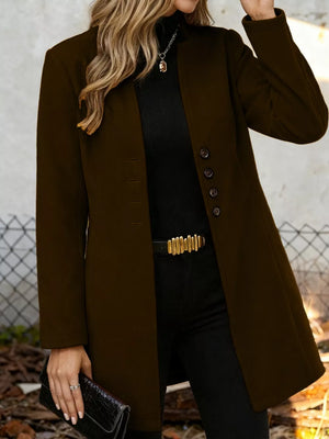 Chic longline trench coat in chocolate with button-down front and collarless neckline.