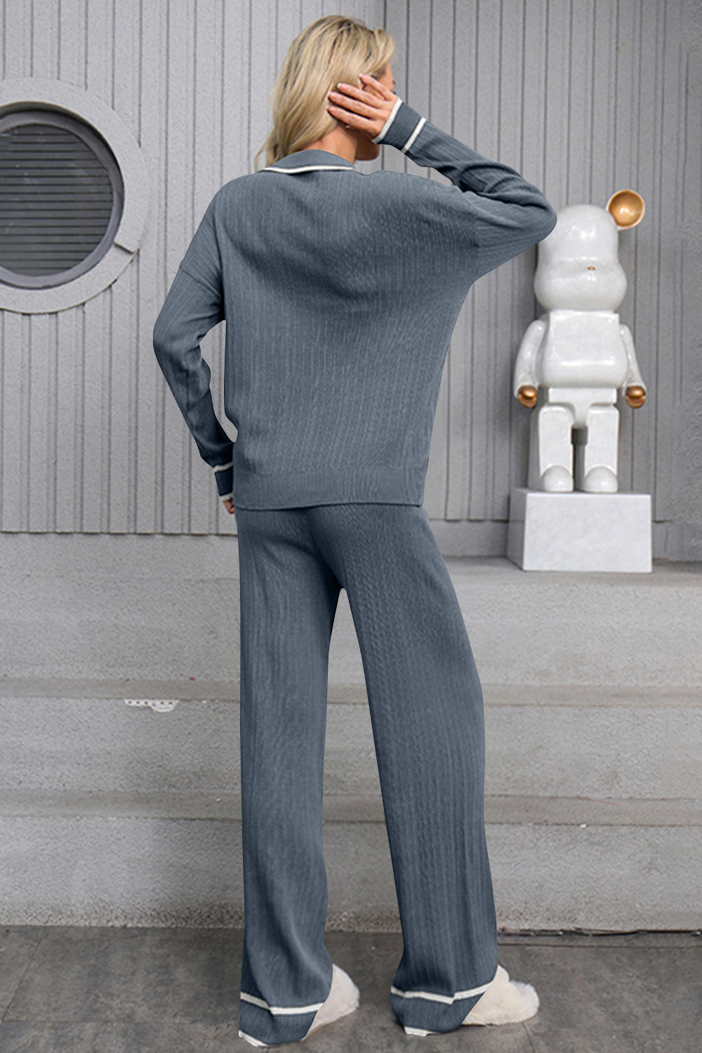 Dusty blue ribbed knit loungewear set with contrast trim, long sleeve top and wide leg pants.