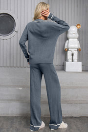 Dusty blue ribbed knit loungewear set with contrast trim, long sleeve top and wide leg pants.