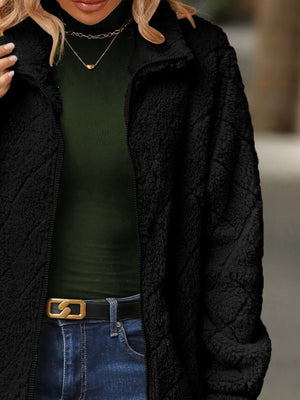Black textured teddy zip-up jacket with a stand-up collar.
