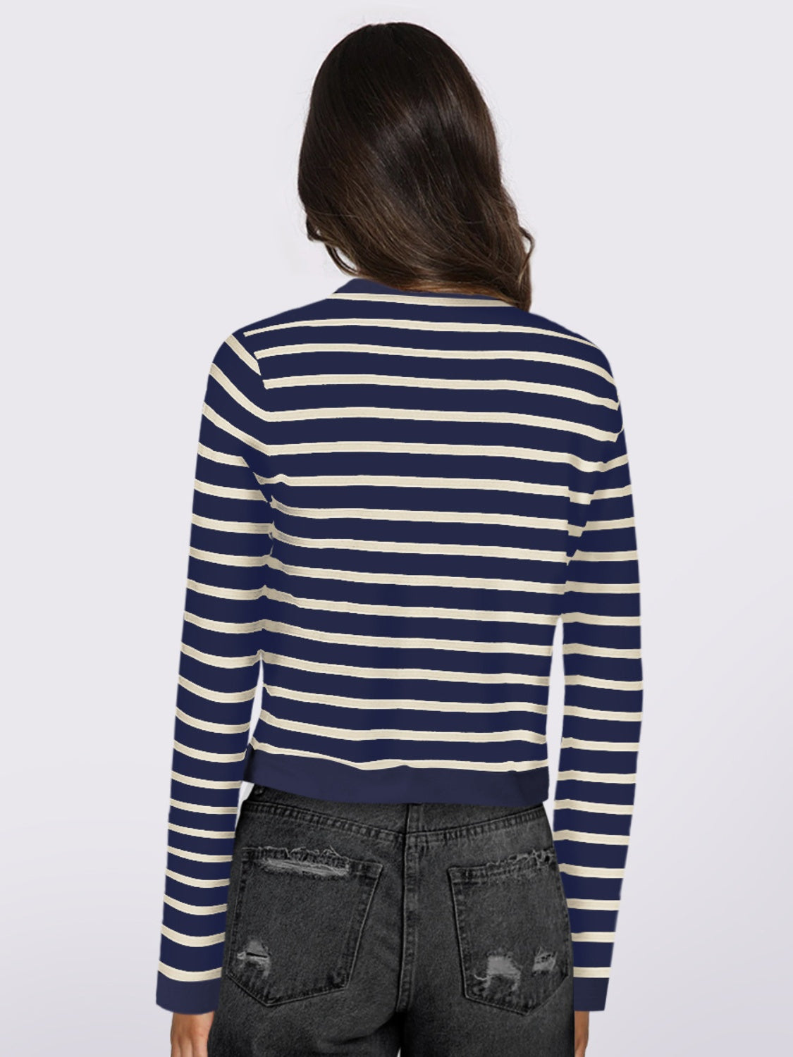 Navy and white striped cropped cardigan with long sleeves.