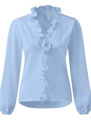 Light blue blouse with cascading ruffle front and balloon sleeves