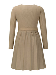 Khaki ribbed knit wrap dress with long sleeves and a pleated skirt.