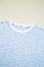 Light blue loungewear set with cable knit texture and white trim neckline