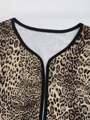 Leopard print boxy jacket with black edge trim and a V-neckline.