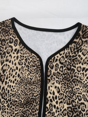 Leopard print boxy jacket with black edge trim and a V-neckline.