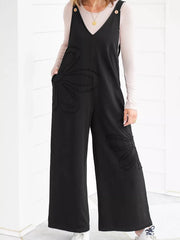 Black cotton wide-leg maternity romper with floral appliqué detail and button straps.