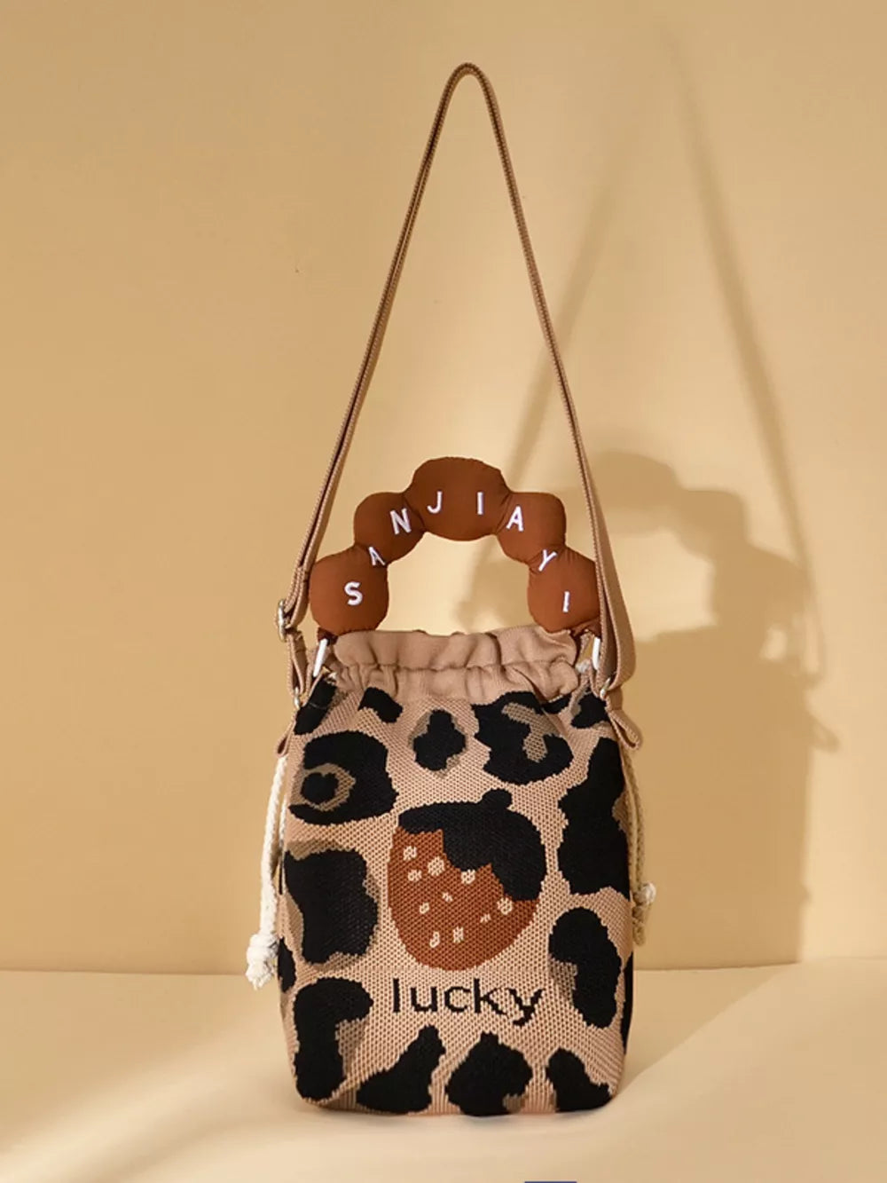 Drawstring Bucket Crossbody Bag in Style D, side view