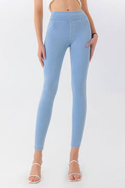Light wash denim-effect leggings with faux pocket detail and a high waist.